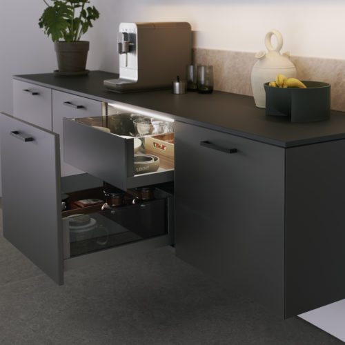 alt="side view of lower hanging cabinets with open drawer and interior pull out"