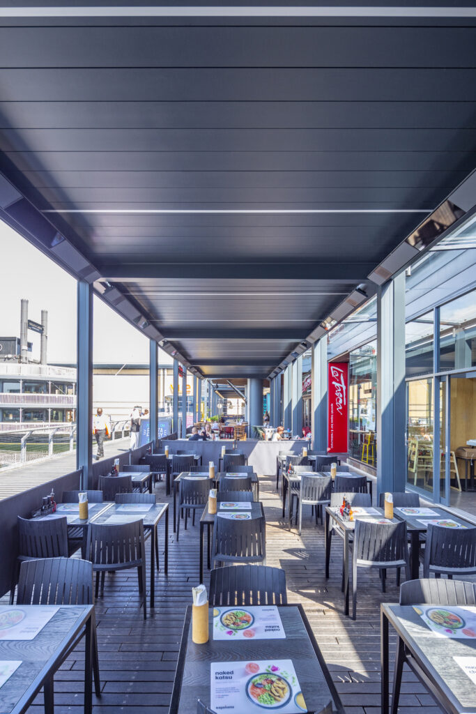 Renson Pergala showcasing outdoor commercial solutions for seating and shade.